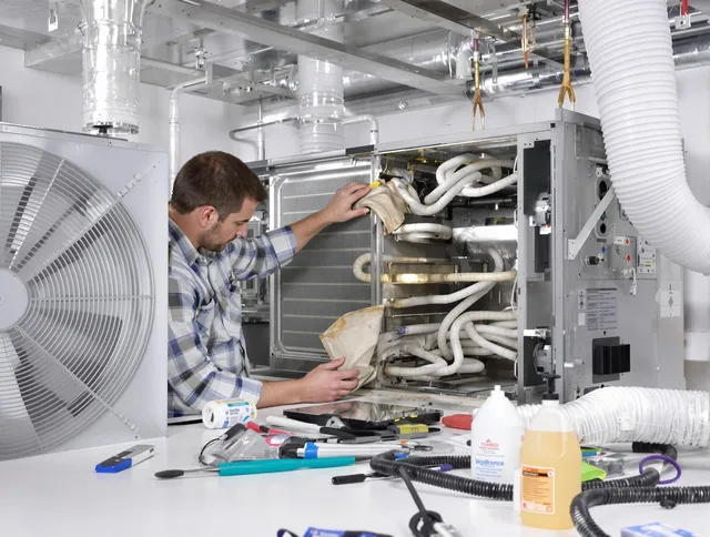 Westborough Air Duct Cleaning specialist performing precision AC coil cleaning in Westborough