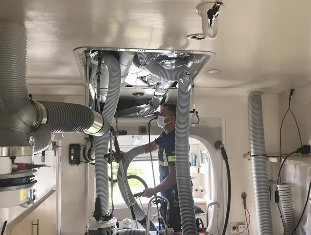 Westborough Air Duct Cleaning specialist performing precise mobile home duct cleaning in Westborough