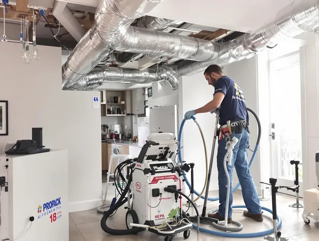 Westborough Air Duct Cleaning technician performing advanced pure duct cleaning with specialized equipment in Westborough